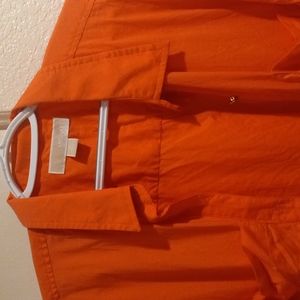 This shirt is used but in good condition..